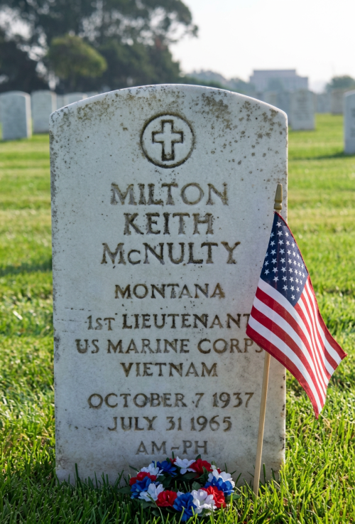 Gravestone for Milton Keith McNulty, 1st Lieutenant US Marine Corps, Vietnam veteran with American flag and wreath